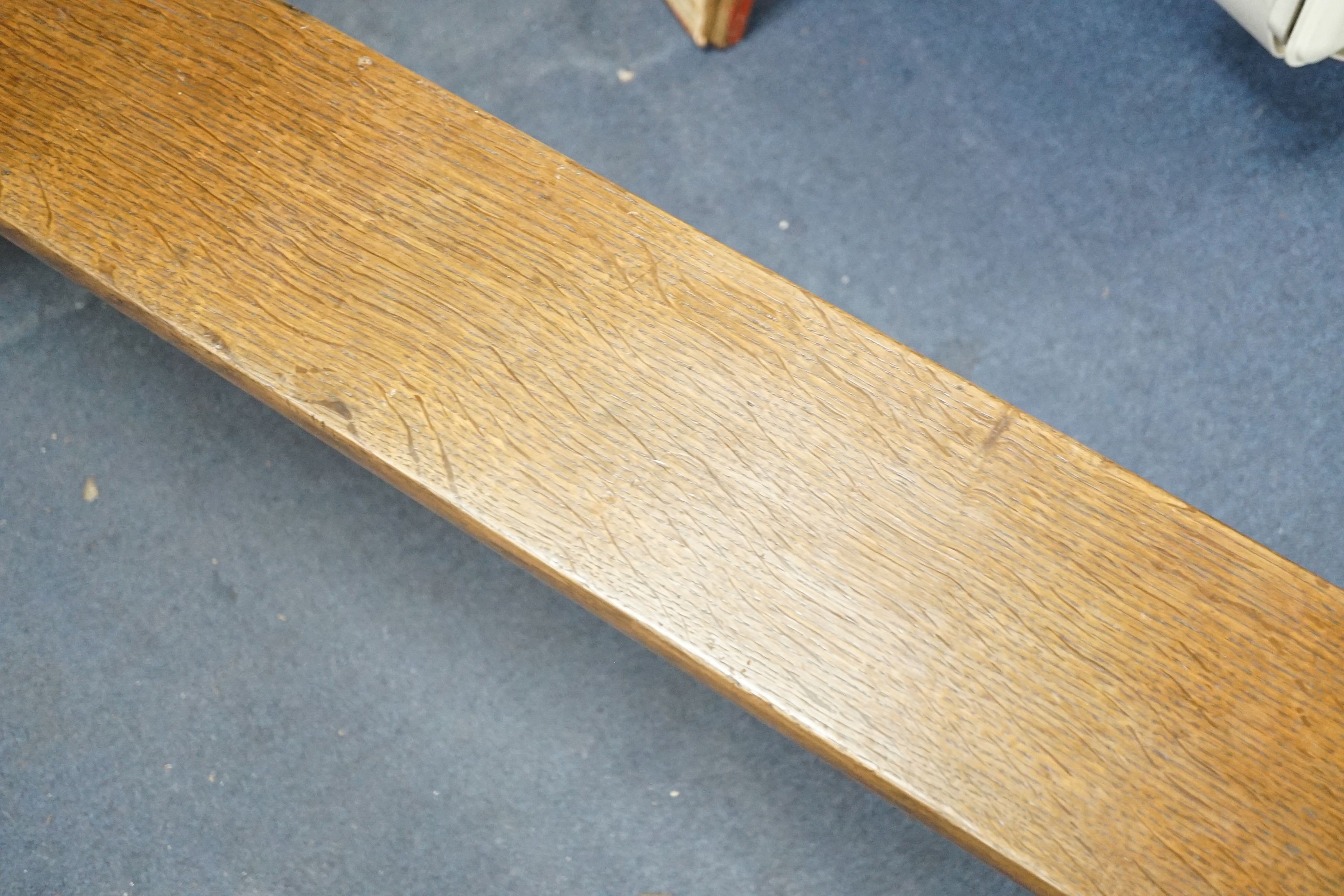 A 19th century French oak bench seat, length 203cm, depth 28cm, height 46cm